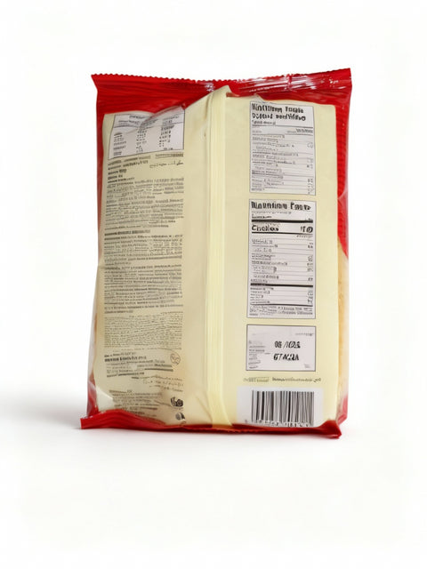 Back view of a snack package with nutrition facts label on a white surface